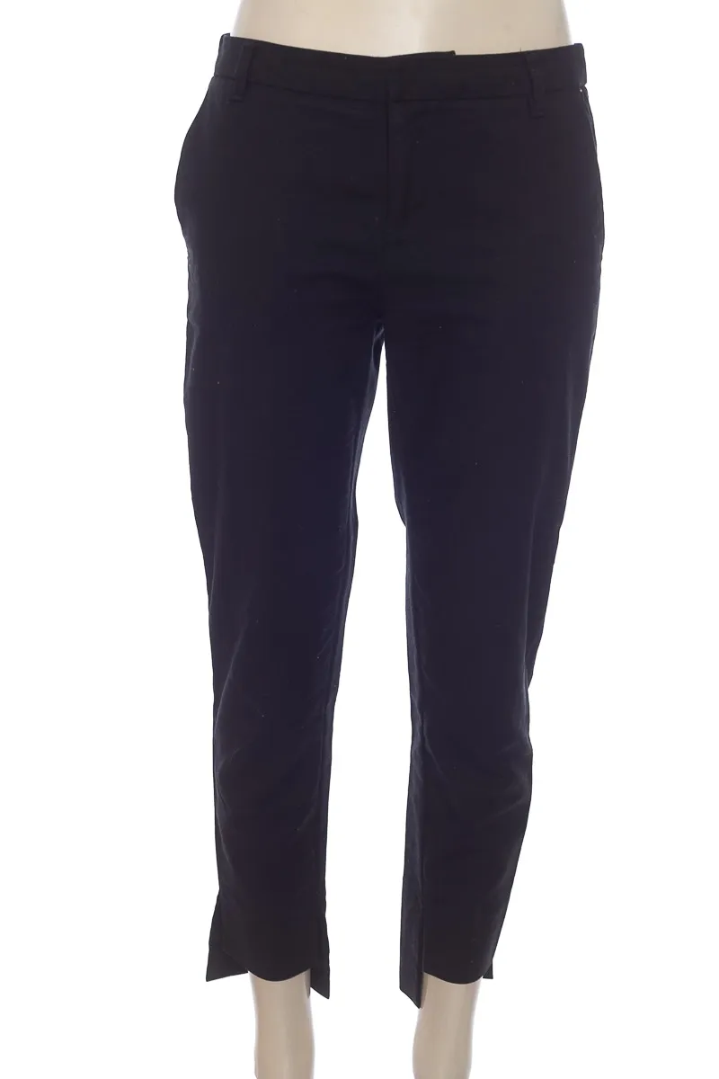PANTALóN COLOR NEGRO  PUNTO BLANCO