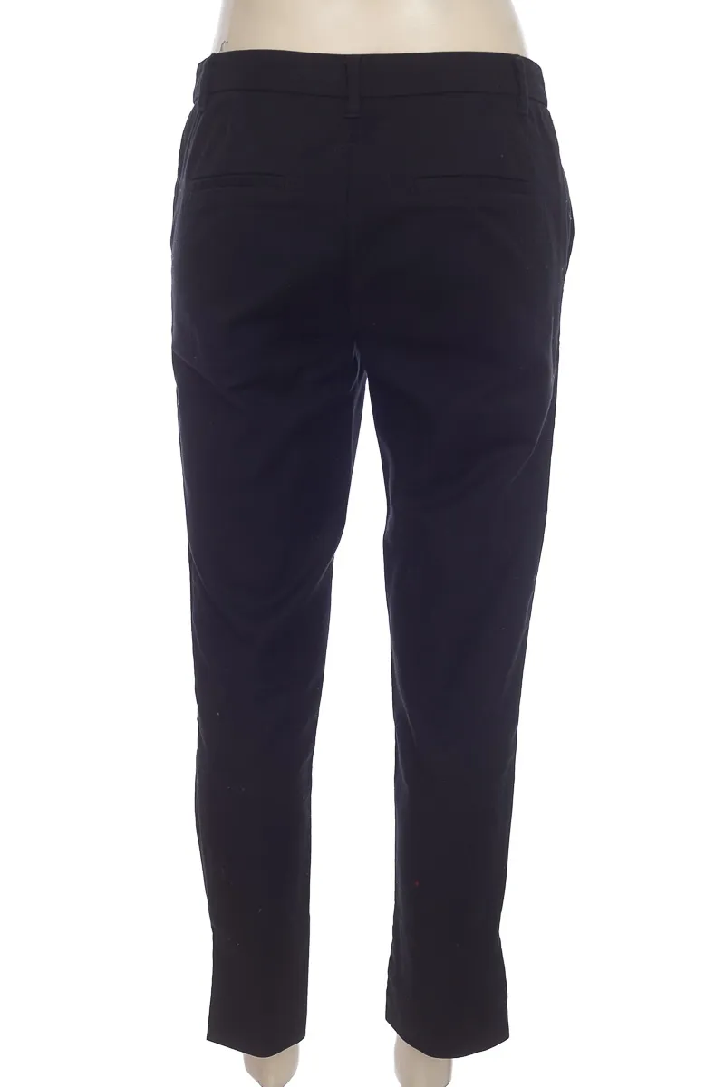 PANTALóN COLOR NEGRO  PUNTO BLANCO