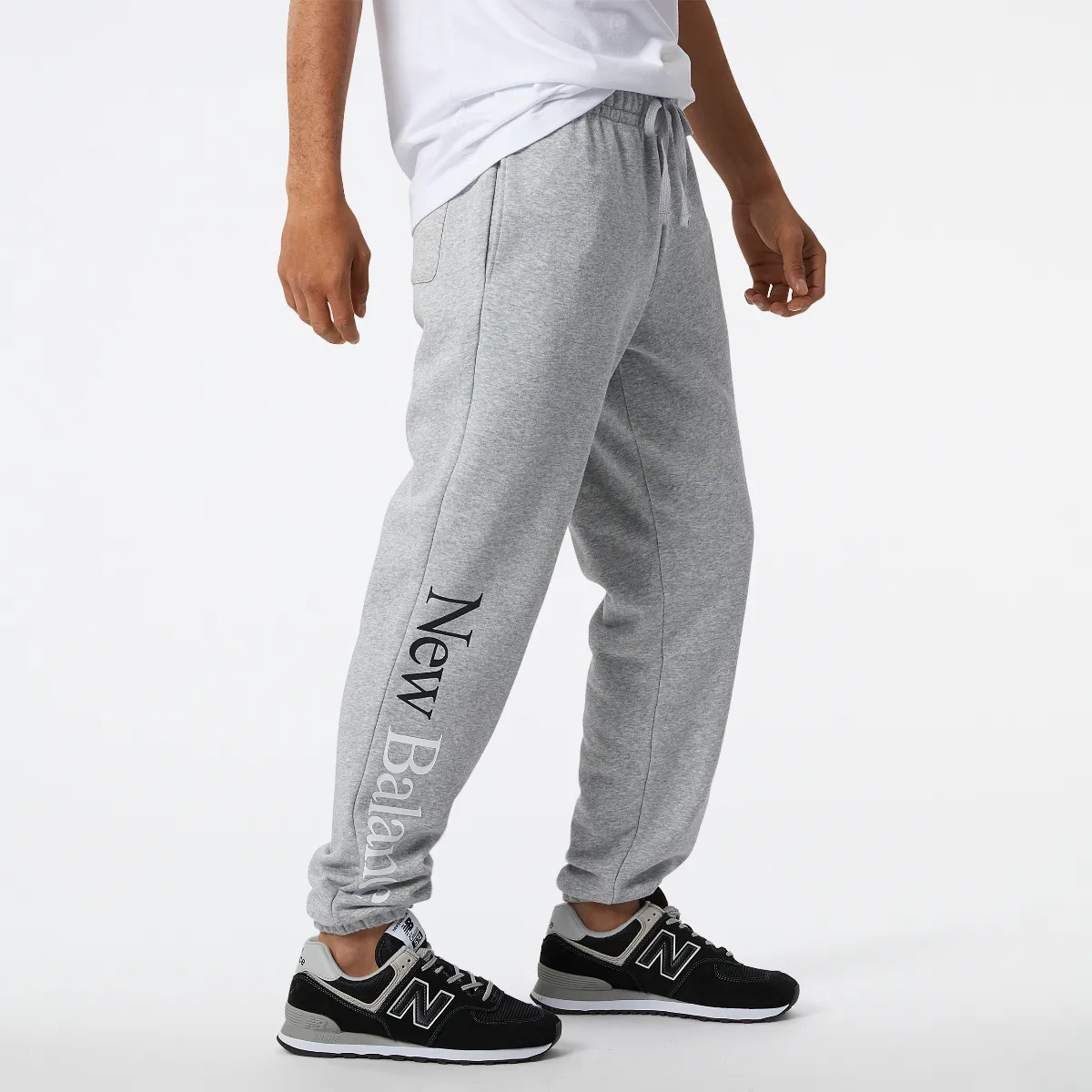 Pantalón Jogger Hombre New Balance Essentials Celebrate Gris
