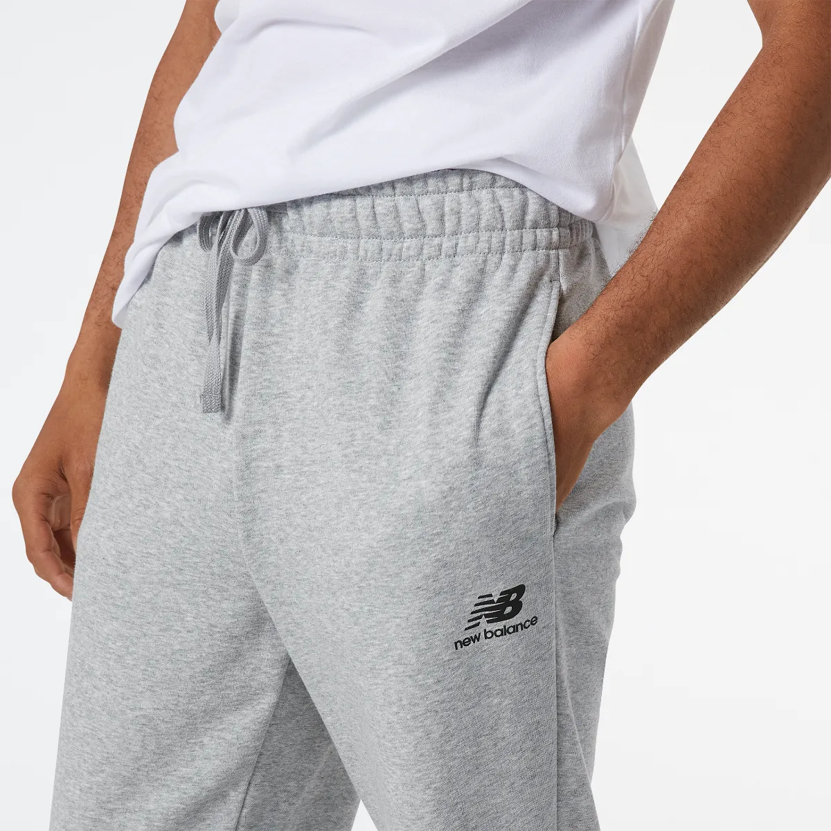 Pantalón Jogger Hombre New Balance Essentials Celebrate Gris
